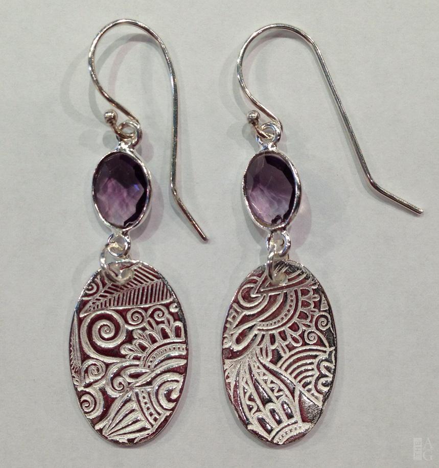 Silver Texture Small Oval Earrings with Bezel Amethyst by Veronica Stewart at The Avenue Gallery, a contemporary fine art gallery in Victoria, BC, Canada.