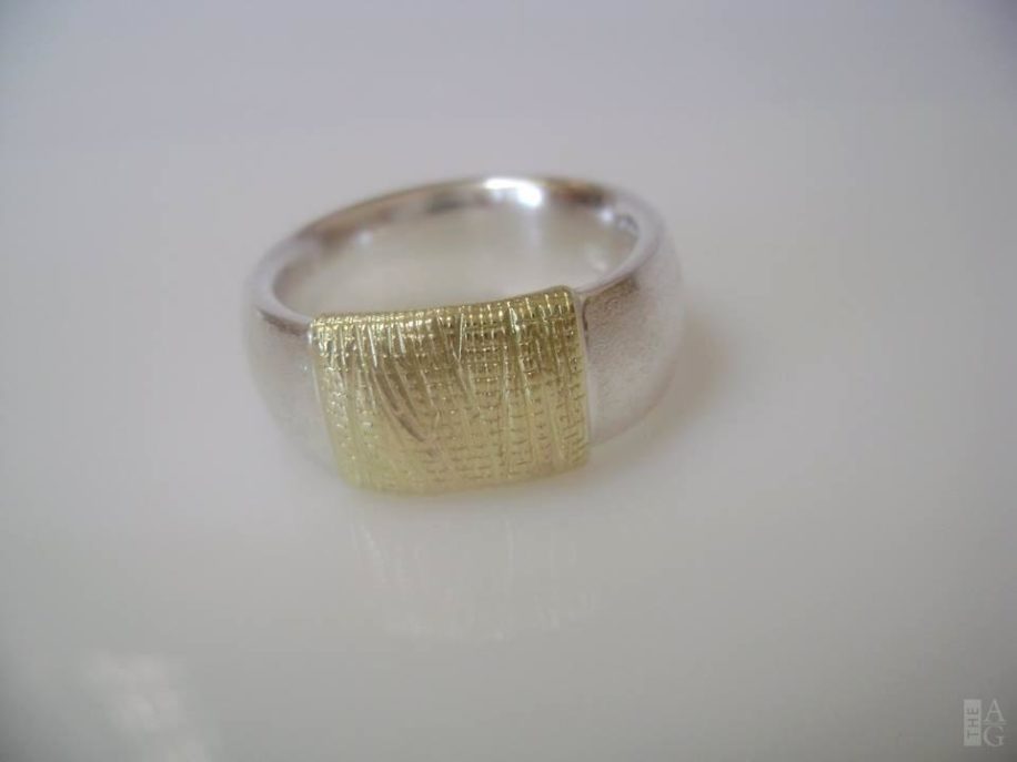 Unique Gold Wrap Ring by jeweller Andrea Roberts at The Avenue Gallery, a contemporary fine art gallery in Victoria, British Columbia, Canada.