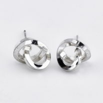 Handmade sterling silver Knot Earrings by Dorothée Rosen at The Avenue Gallery, a contemporary fine art gallery in Victoria, BC, Canada.