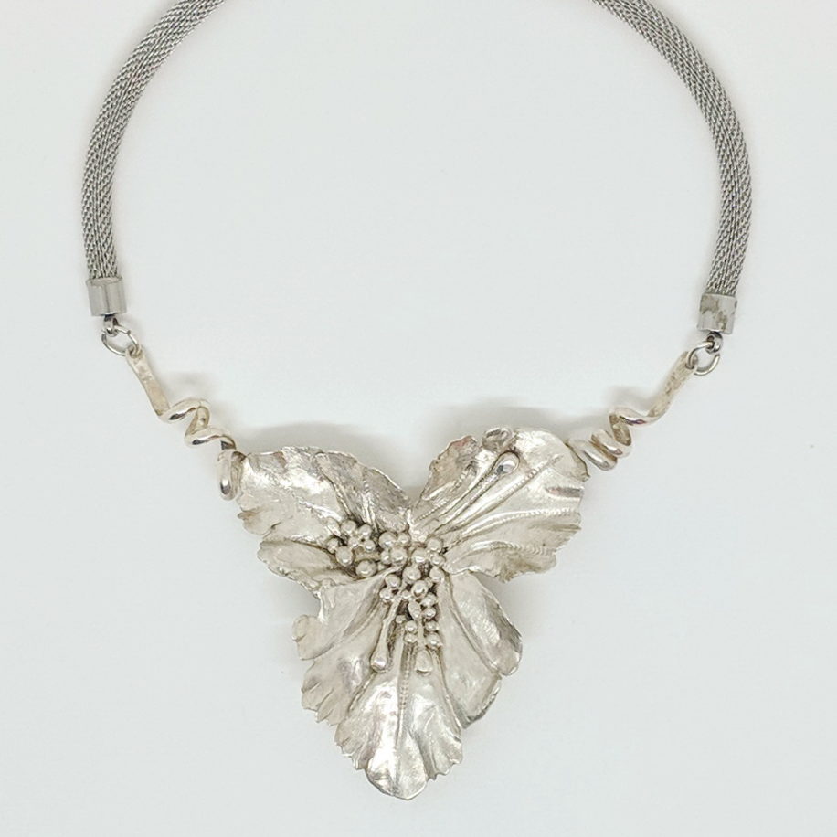 Silver Floral Necklace by jeweller Darlene Letendre at The Avenue Gallery, a contemporary fine art gallery in Victoria, BC, Canada.