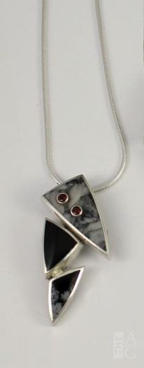 Pinolith, Black Jade, Snowflake Obsidian and Garnet Pendant by Brenda Roy at The Avenue Gallery, a contemporary fine art gallery in Victoria, BC, Canada.