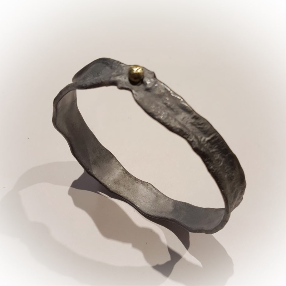 Oxidised Silver Bangle with Gold Ball by Barbara Adams at The Avenue Gallery, a contemporary fine art gallery in Victoria, BC, Canada.