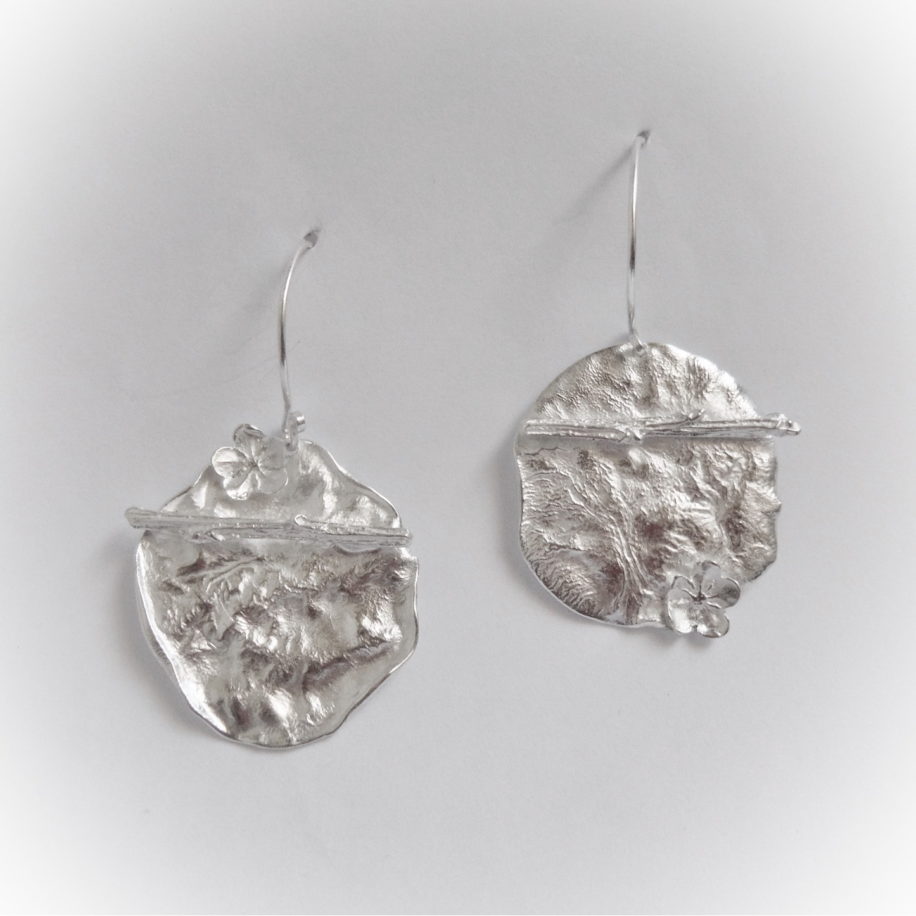 Round with Top Crossed Branch Earrings by Andrea Russell at The Avenue Gallery, a contemporary fine art gallery in Victoria, BC, Canada.