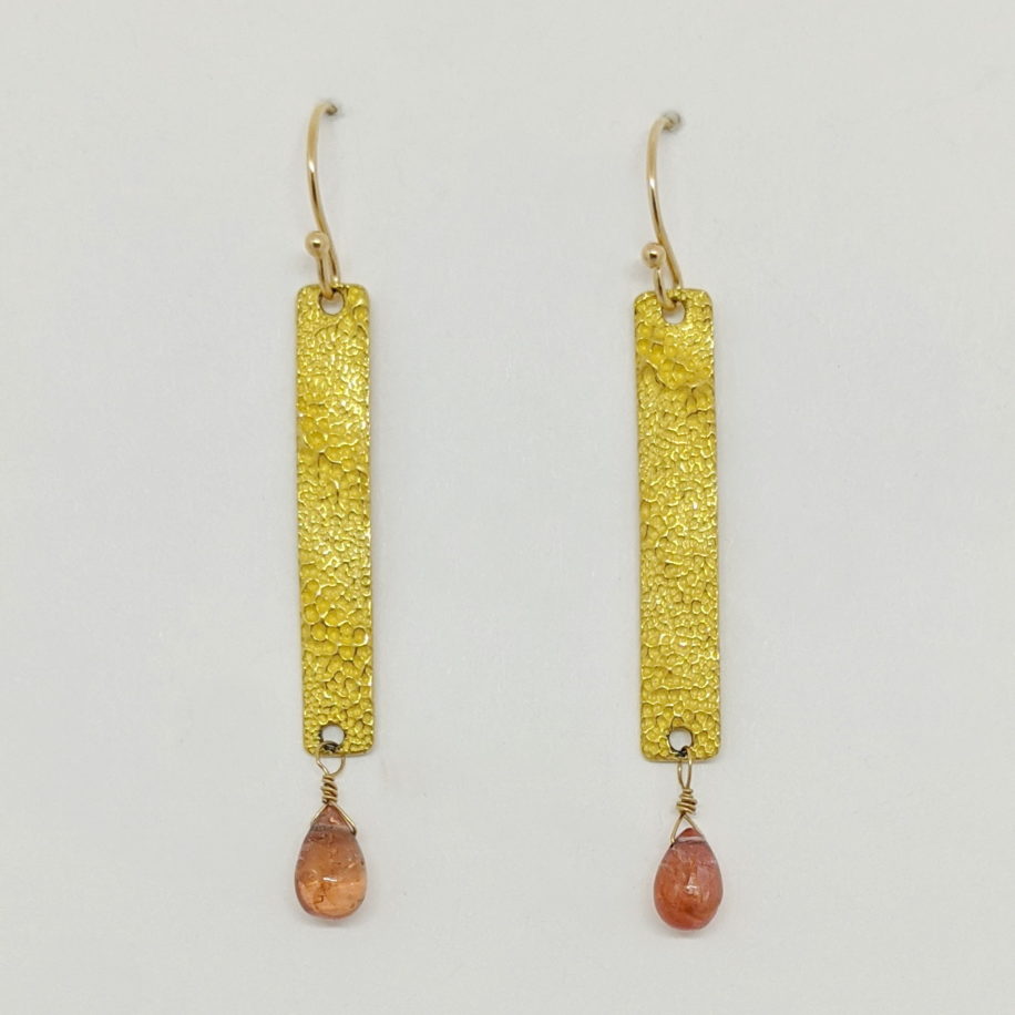 22kt. Gold Long Textured Earrings with Peach Tourmaline Drops by Veronica Stewart at The Avenue Gallery, a contemporary fine art gallery in Victoria, BC, Canada.
