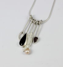 Black Jade, Garnet and Pearl Dangly Necklace by Brenda Roy at The Avenue Gallery, a contemporary fine art gallery in Victoria, BC, Canada.