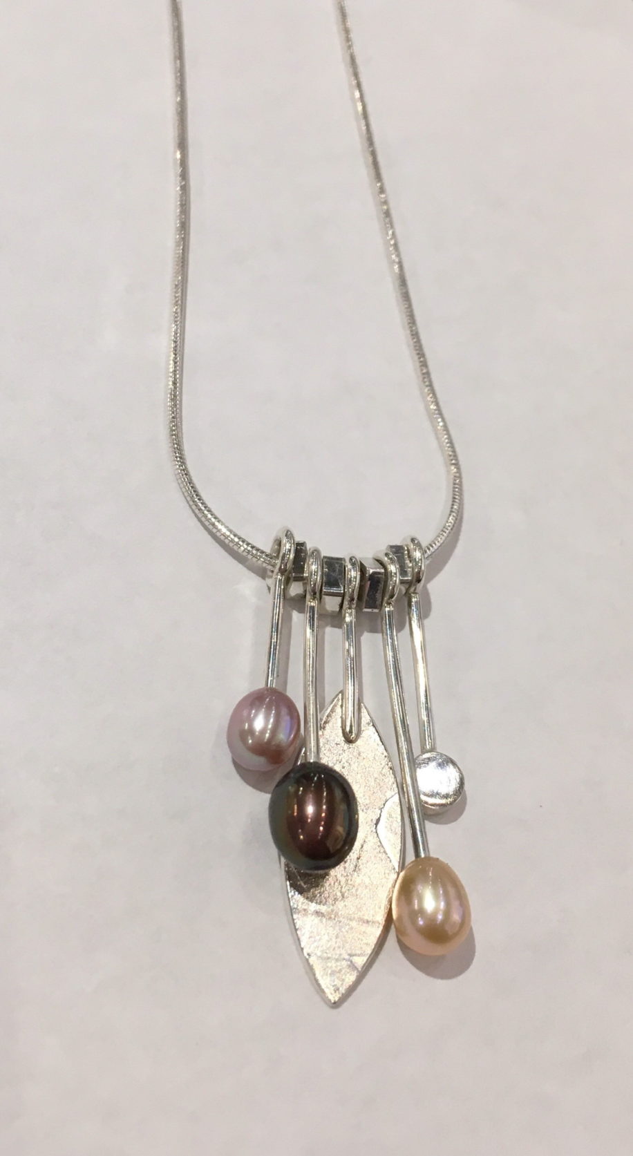 Freshwater Pearls Dangly Necklace by Brenda Roy at The Avenue Gallery, a contemporary fine art gallery in Victoria, BC, Canada.