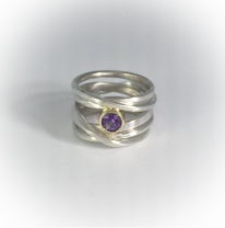 Sterling Silver OneFooter Ring with 5.5mm Amethyst in 18kt Yellow Gold by Dorothée Rosen at The Avenue Gallery, a contemporary fine art gallery in Victoria, BC, Canada.