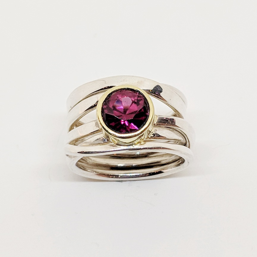 OneFooter Ring with Rhodolite Garnet by Dorothée Rosen at The Avenue Gallery, a contemporary fine art gallery in Victoria, BC, Canada.