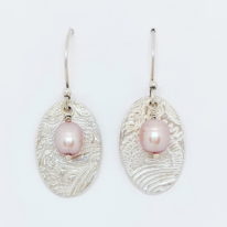 Textured Silver Small Oval Earrings with Pink Pearls by Veronica Stewart at The Avenue Gallery, a contemporary fine art gallery in Victoria, BC, Canada.