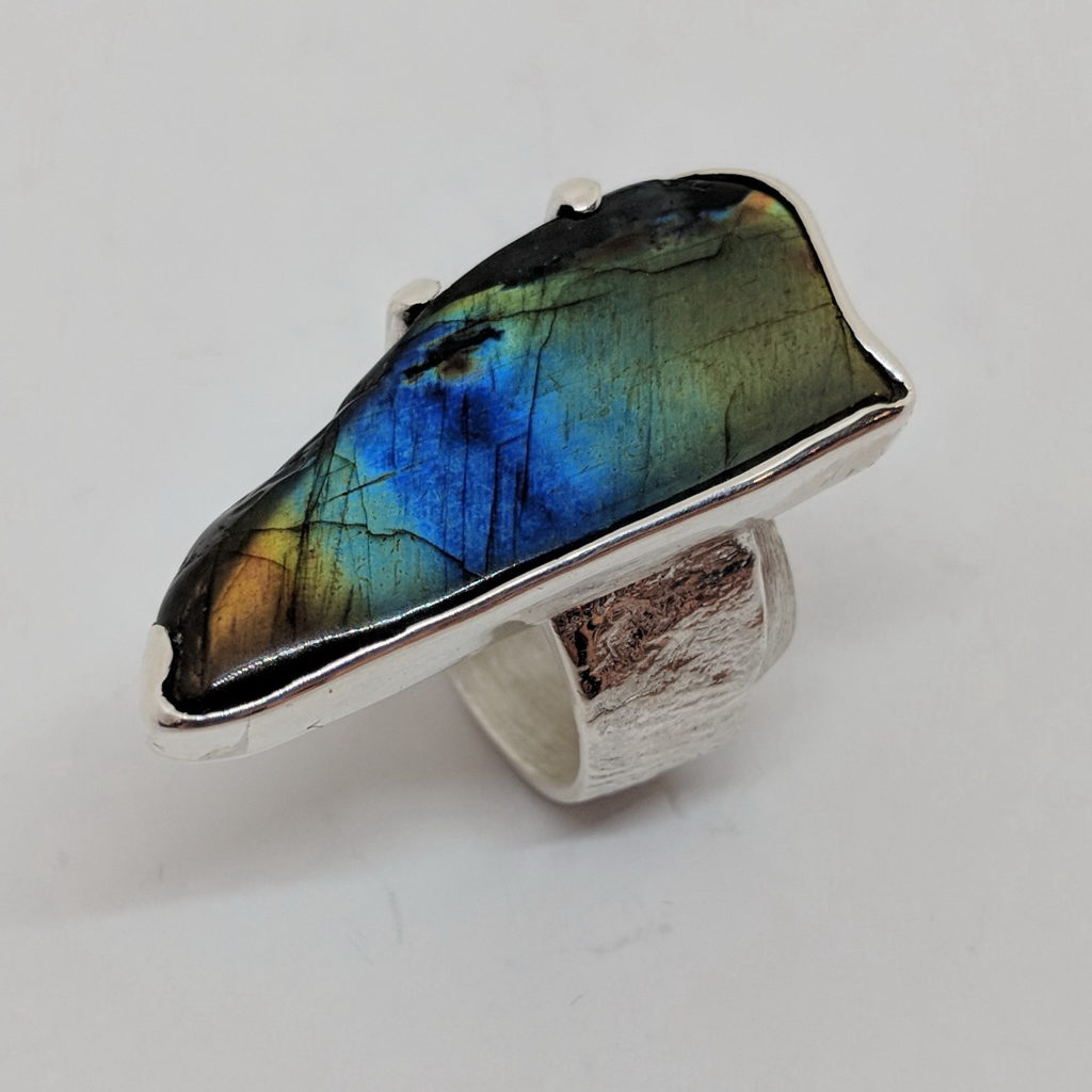 Spectralite and Silver Ring by Andrea Russell at The Avenue Gallery, a contemporary art gallery in Victoria, B.C. Canada