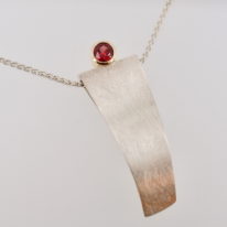 Sterling Silver & Red Zircon Pendant by Bayot Heer at The Avenue Gallery, a contemporary fine art gallery in Victoria, BC, Canada.
