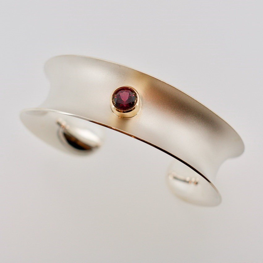 Silver Bracelet with Rhodolite Garnet by Bayot Heer at The Avenue Gallery, a contemporary fine art gallery in Victoria, BC, Canada.