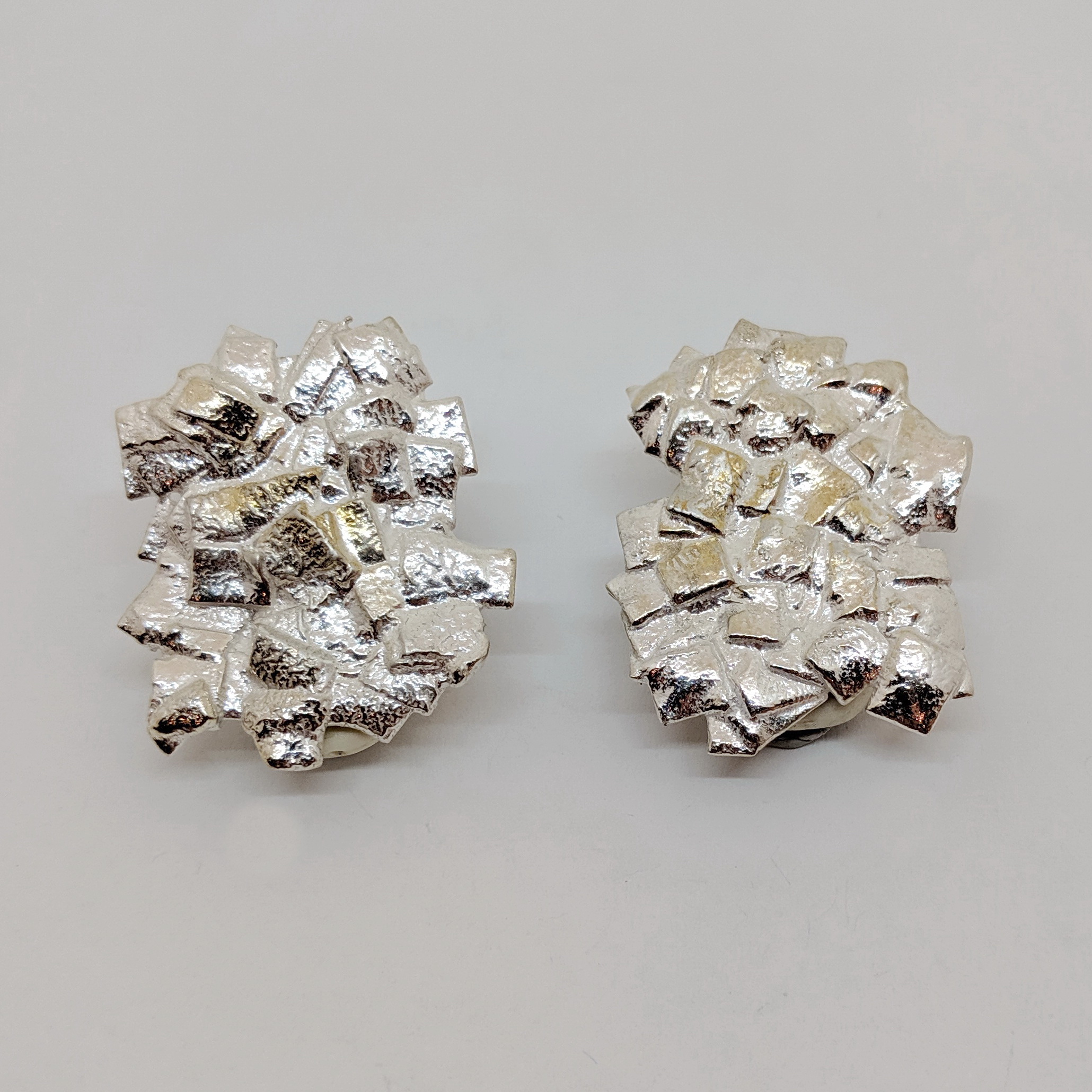 Silver Clip-On Earrings by Barbara Adams - The Avenue Gallery
