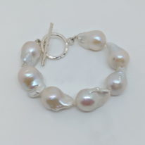 White Baroque Freshwater Pearl Bracelet by Val Nunns at The Avenue Gallery, a contemporary fine art gallery in Victoria, BC, Canada.