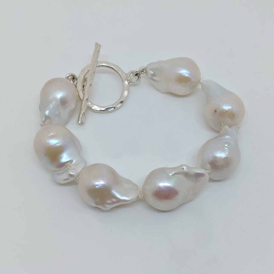 White Baroque Freshwater Pearl Bracelet by Val Nunns at The Avenue Gallery, a contemporary fine art gallery in Victoria, BC, Canada.