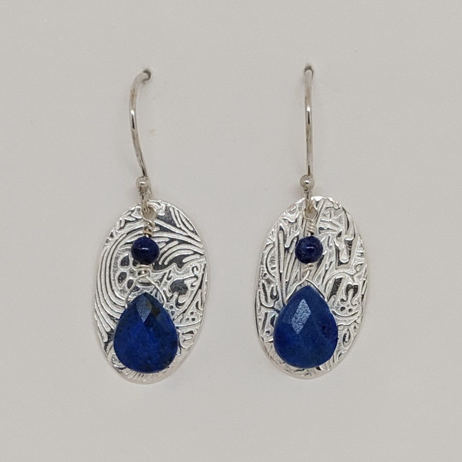 Large Textured Oval Earrings with Lapis by Veronica Stewart at The Avenue Gallery, a contemporary fine art gallery in Victoria, BC, Canada.