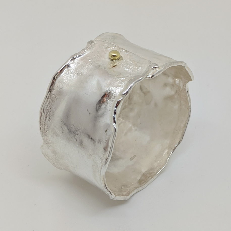 Wide Reticulated Silver Bangle with Gold Ball by Barbara Adams at The Avenue Gallery, a contemporary fine art gallery in Victoria, BC, Canada.