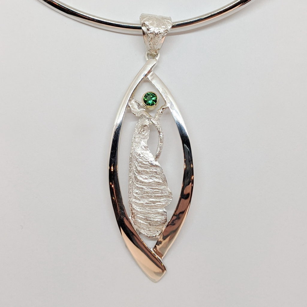 Sterling Silver & Green Tourmaline Pendant by Andrea Russell at The Avenue Gallery, a contemporary fine art gallery in Victoria, BC, Canada.