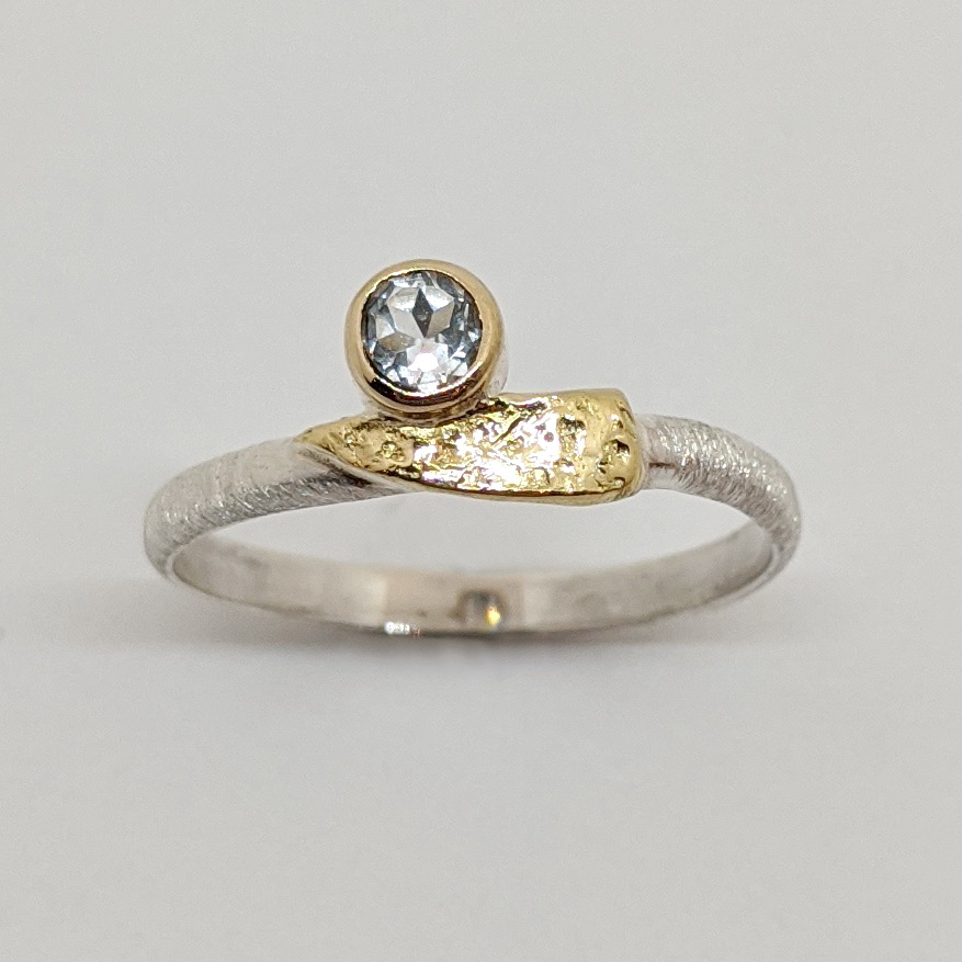 Silver, Gold & White Topaz Slender Band Ring by Andrea Russell at The Avenue Gallery, a contemporary fine art gallery in Victoria, BC, Canada.