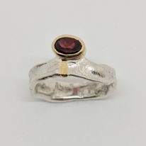 Silver, Gold & Garnet Ring by Andrea Russell at The Avenue Gallery, a contemporary fine art gallery in Victoria, BC, Canada.