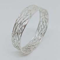 Twig Bangle (Medium) by A & R Jewellery at The Avenue Gallery, a contemporary fine art gallery in Victoria, BC, Canada.