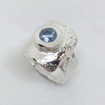 Textured Ring with Blue Cubic Zirconia by Veronica Stewart at The Avenue Gallery, a contemporary fine art gallery in Victoria, BC, Canada.
