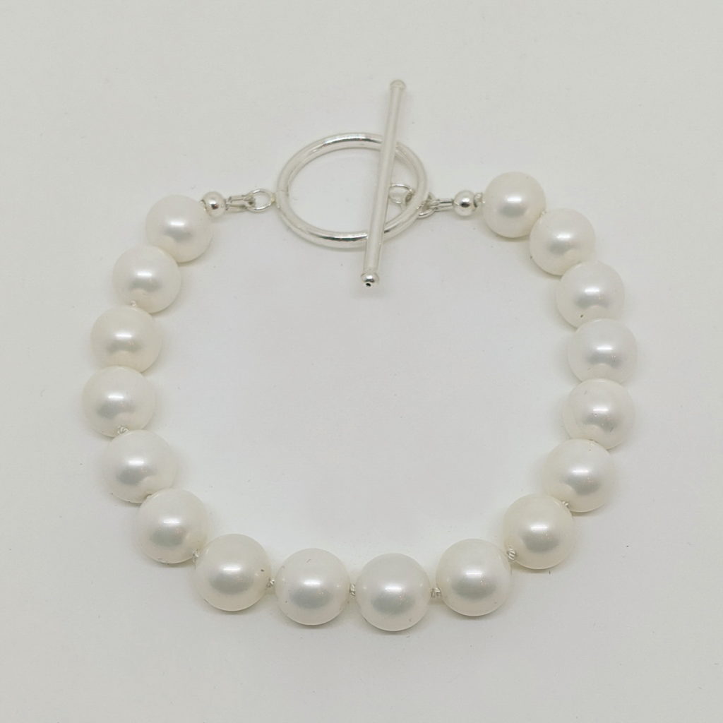 White Freshwater Pearl Bracelet with Sterling Silver by Val Nunns at The Avenue Gallery, a contemporary fine art gallery in Victoria, BC, Canada.