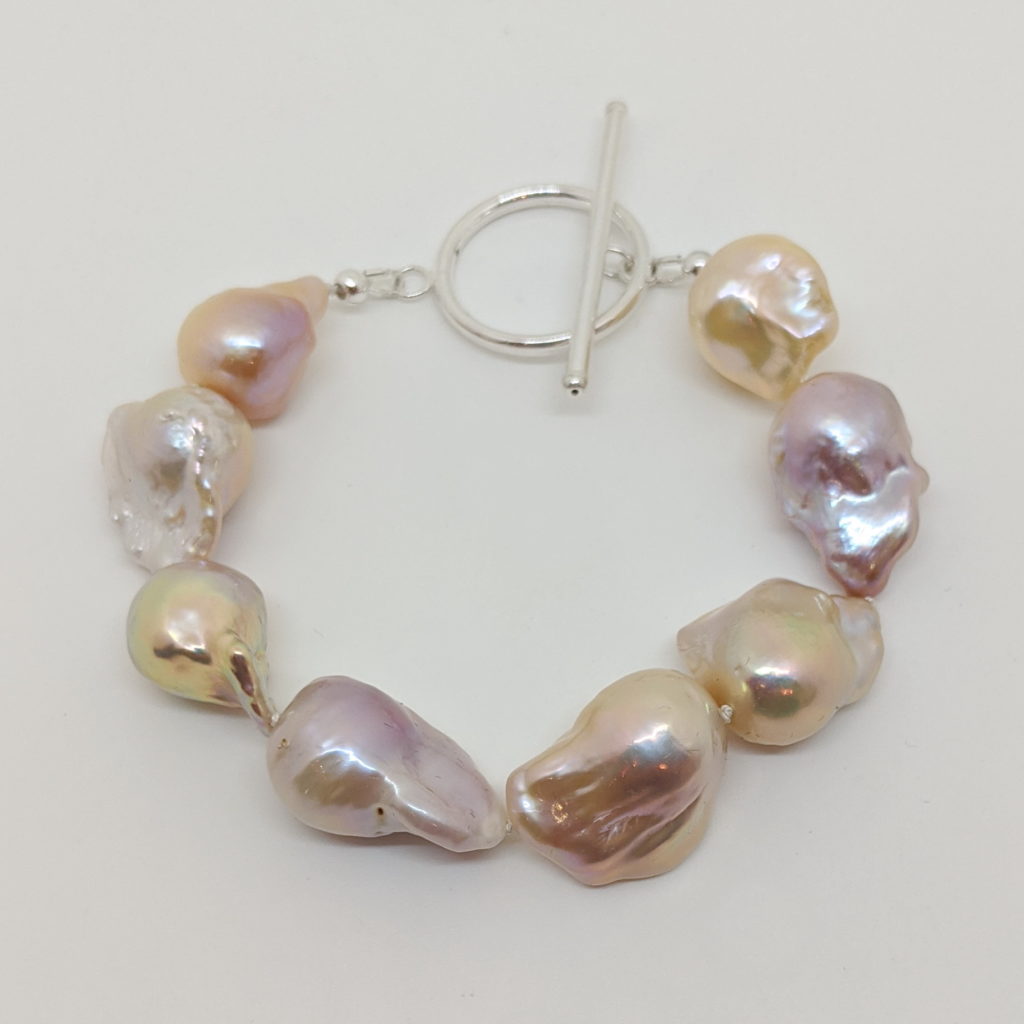 Pale Pink Baroque Pearl Bracelet with Sterling Silver Toggle by Val Nunns at The Avenue Gallery, a contemporary fine art gallery in Victoria, BC, Canada.