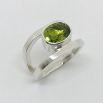 Double Band Ring with Peridot by A & R Jewellery at The Avenue Gallery, a contemporary fine art gallery in Victoria, BC, Canada.