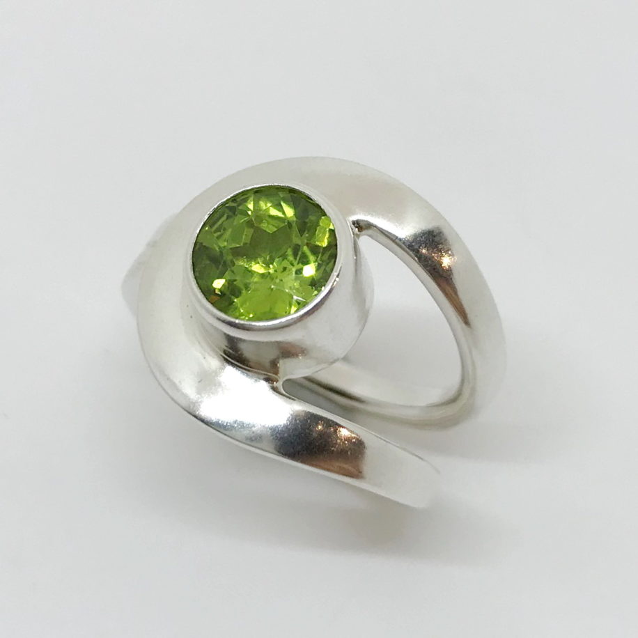 Buttonhole Ring with Peridot by A & R Jewellery at The Avenue Gallery, a contemporary fine art gallery in Victoria, BC, Canada.