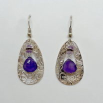 Fine Silver Large Hollow Oval Textured Earrings with Amethyst Drops by Veronica Stewart at The Avenue Gallery, a contemporary fine art gallery in Victoria, BC, Canada.