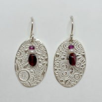 Fine Silver Textured Earrings with Garnet (Large) by Veronica Stewart at The Avenue Gallery, a contemporary fine art gallery in Victoria, BC, Canada.