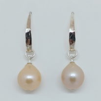 Peach Edison Pearl & Hammered Silver Earrings by Val Nunns at The Avenue Gallery, a contemporary fine art gallery in Victoria, BC, Canada.
