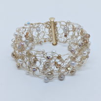 Gold Filled Crochet Wire Cuff with Freshwater Pearls and Swarovski Crystals by Veronica Stewart at The Avenue Gallery, a contemporary fine art gallery in Victoria, BC, Canada.