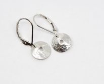 Small Textured Silver Earrings with holes by ARTYRA Studio at The Avenue Gallery, a contemporary fine art gallery in Victoria, BC, Canada.