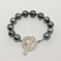 Tahitian Pearl Bracelet with Large Hammered Sterling Silver Clasp by Val Nunns at The Avenue Gallery, a contemporary fine art gallery in Victoria, BC, Canada.