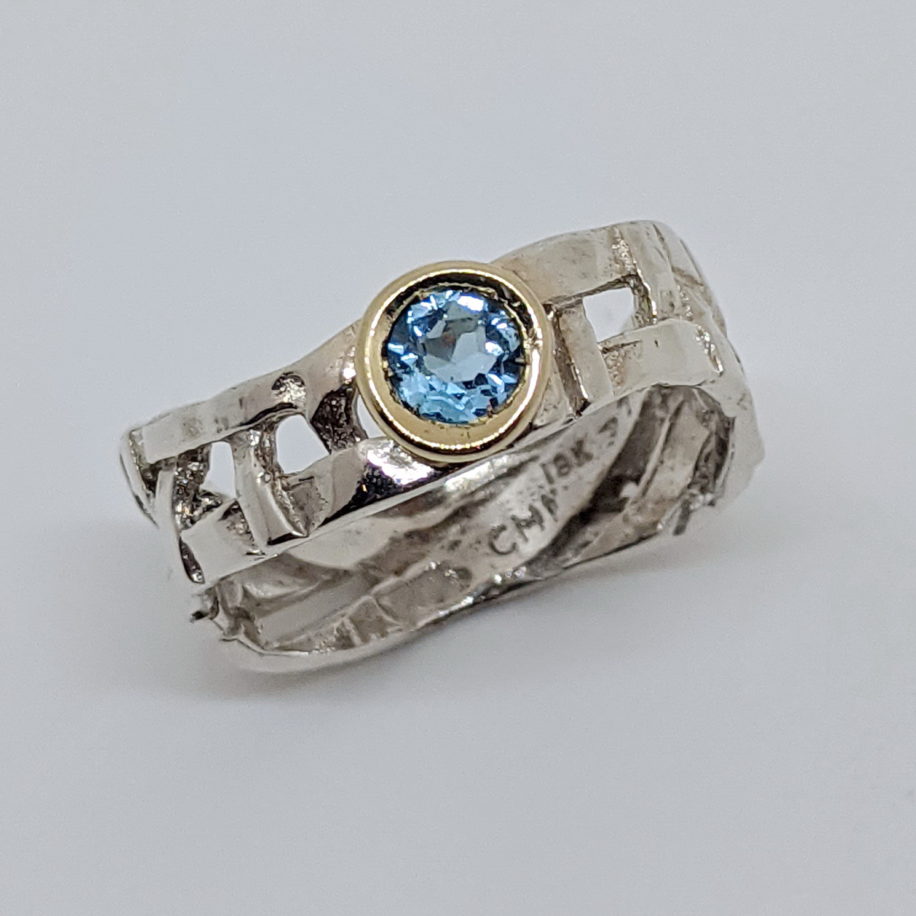 Skinny Woven Basket Ring with Blue Topaz by Chi's Creations at The Avenue Gallery, a contemporary fine art gallery in Victoria, BC, Canada.