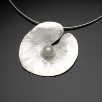 Floating Lily Pad Necklace by Chi’s Creations at The Avenue Gallery, a contemporary fine art gallery in Victoria, BC, Canada.