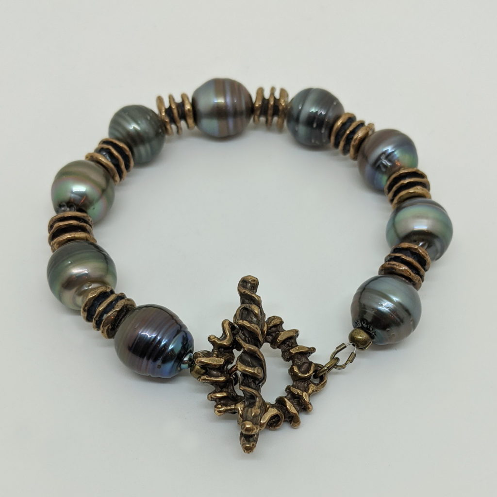 Tahitian Pearl Bracelet with Bronze Beads & Clasp by Val Nunns at The Avenue Gallery, a contemporary fine art gallery in Victoria, BC, Canada.