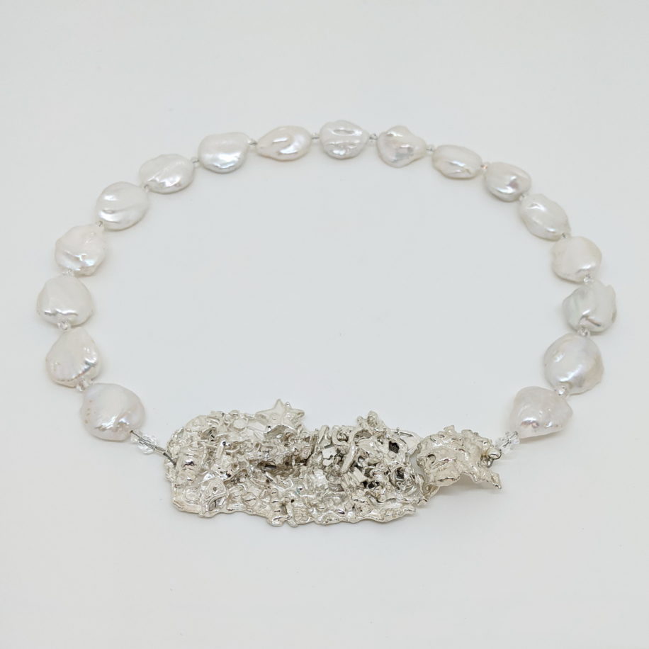 Freshwater Pearl Necklace with Reticulated Silver Clasp by Barbara Adams at The Avenue Gallery, a contemporary fine art gallery in Victoria, BC, Canada.