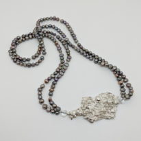 Grey Freshwater Pearl Necklace with Reticulated Silver Clasp by Barbara Adams at The Avenue Gallery, a contemporary fine art gallery in Victoria, BC, Canada.