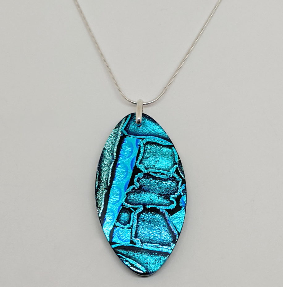 Mosaic Pendant (Small Flat Oval) by Peggy Brackett at The Avenue Gallery, a contemporary fine art gallery in Victoria, BC, Canada.