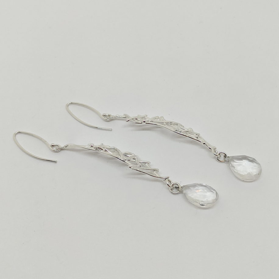 Long Ladder Twigs Earrings with Clear Quartz by A & R Jewellery at The Avenue Gallery, a contemporary fine art gallery in Victoria, BC, Canada.