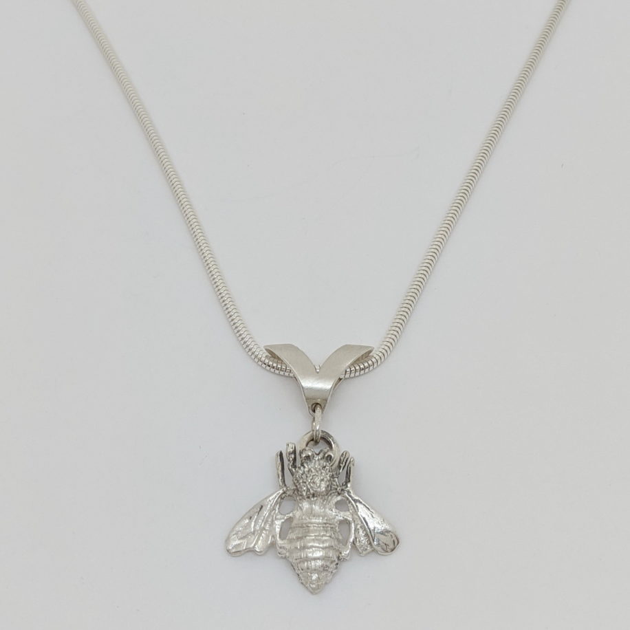 Argentium & Sterling Silver Bee Pendant by Darlene Letendre at The Avenue Gallery, a contemporary fine art gallery in Victoria, BC, Canada.