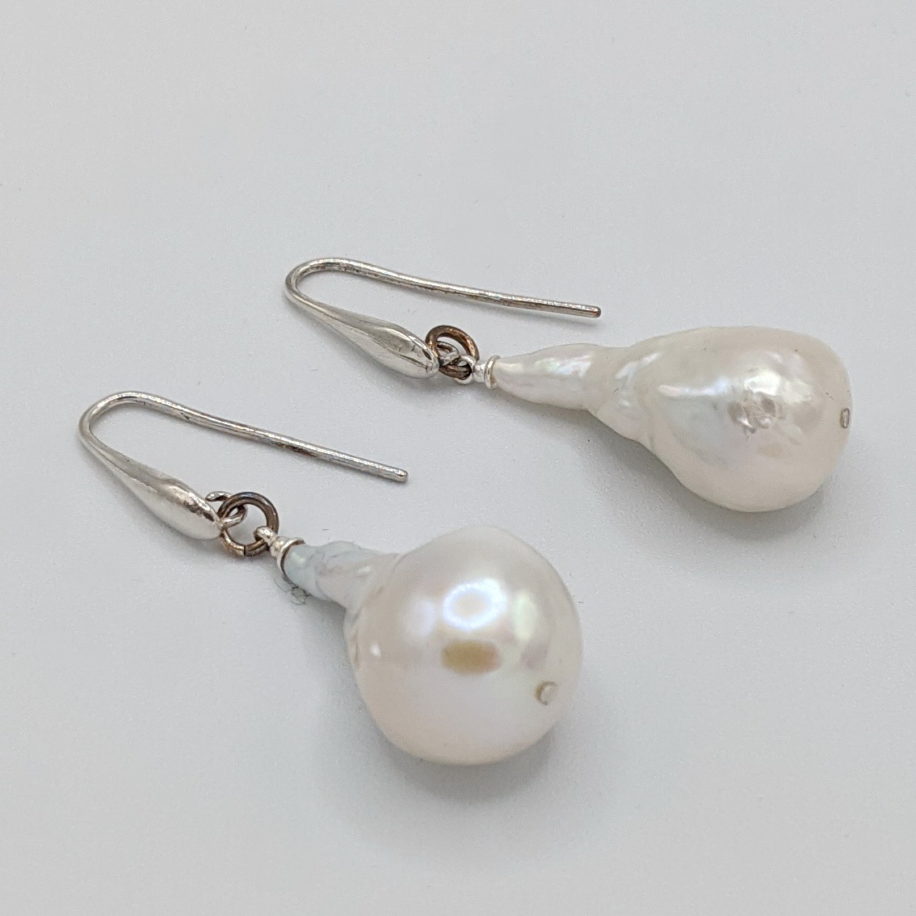 Long Baroque Pearl Earrings by Val Nunns at The Avenue Gallery, a contemporary fine art gallery in Victoria, BC, Canada.