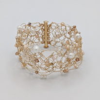 Crocheted Gold-Fill Cuff with Pearls & Clear Swarovski Crystals by Veronica Stewart at The Avenue Gallery, a contemporary fine art gallery in Victoria, BC, Canada.