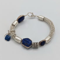 Silver Viking Knit Bracelet with Lapis by Veronica Stewart at The Avenue Gallery, a contemporary fine art gallery in Victoria, BC, Canada.