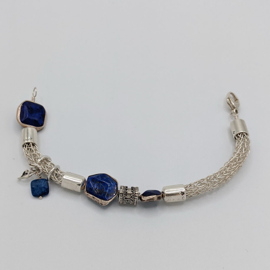 Silver Viking Knit Bracelet with Lapis by Veronica Stewart at The Avenue Gallery, a contemporary fine art gallery in Victoria, BC, Canada.