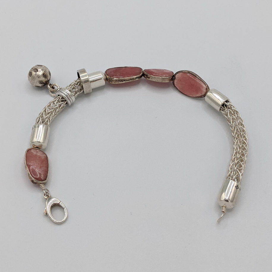 Silver Viking Knit Bracelet with Pink Quartz by Veronica Stewart at The Avenue Gallery, a contemporary fine art gallery in Victoria, BC, Canada.