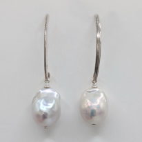 White Small Baroque Pearl Earrings on Sterling Silver Wires by Val Nunns at The Avenue Gallery, a contemporary fine art gallery in Victoria, BC, Canada.